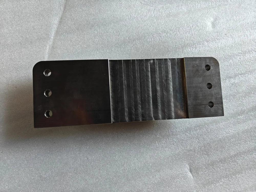 Tungsten ballast piece